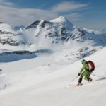 person skiing down mountain