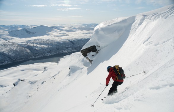 person skiing down mountain