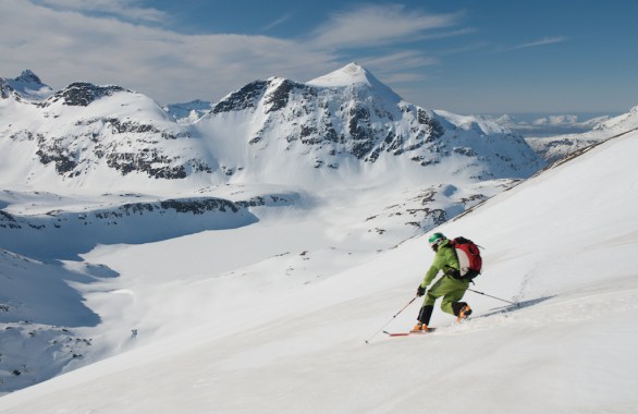 person skiing down mountain