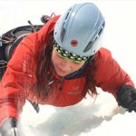 girl climbing ice wall