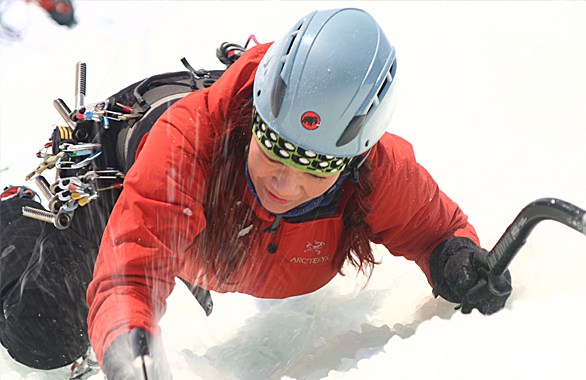 girl climbing ice wall